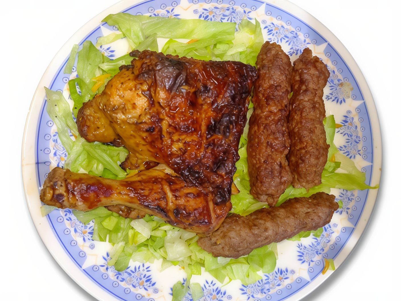 Meal of 3 Kofta pieces and a quarter chicken with bread and salad