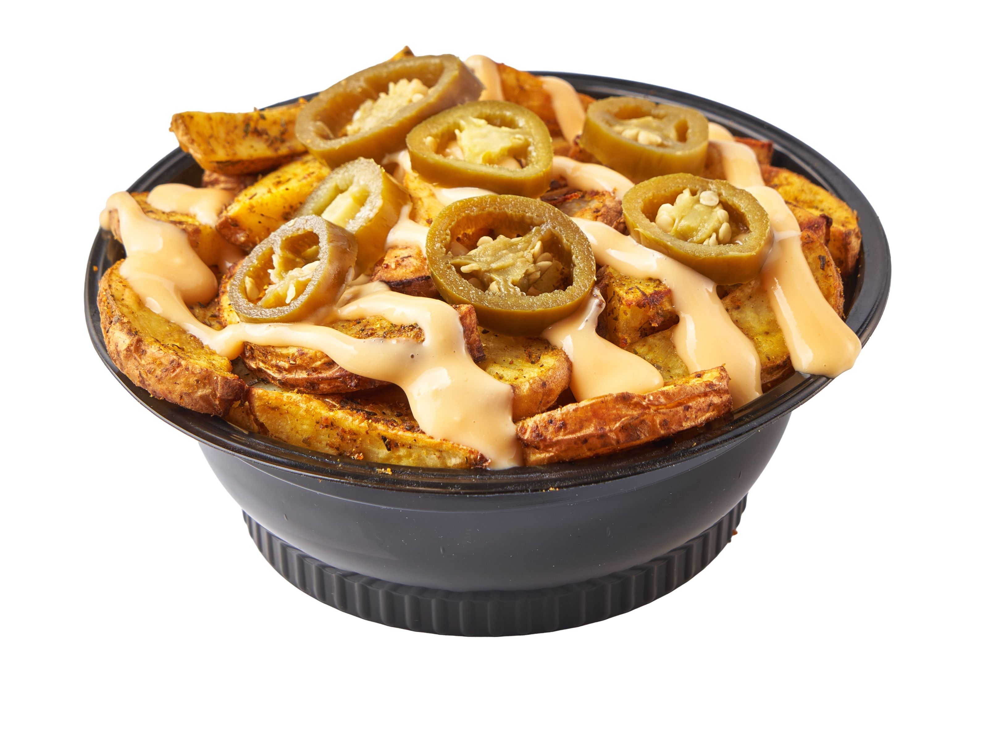 Potato wedges with jalapeño and cheese sauce