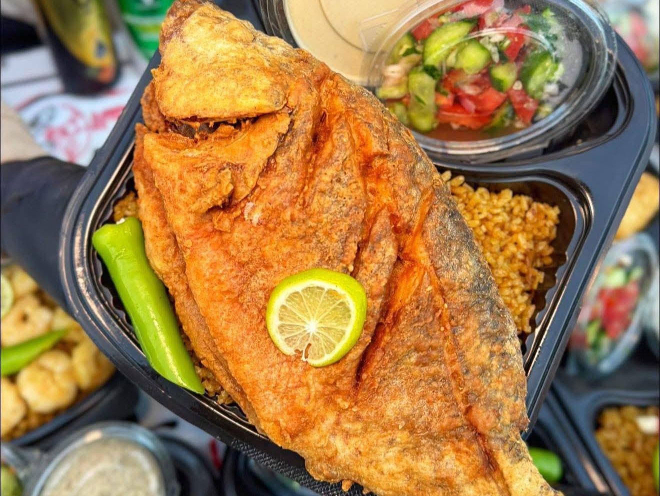Tilapia fish and Sayadieh rice