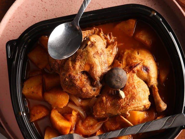 Potato casserole with half a chicken