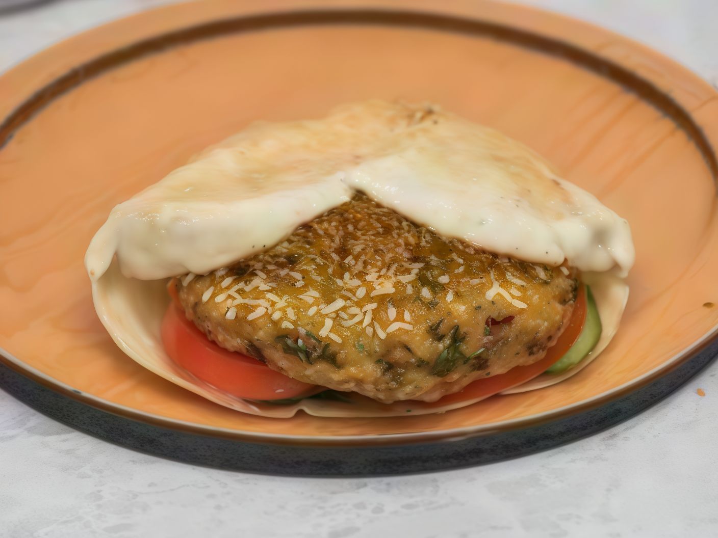 Falafel sandwich with cheese and tomato