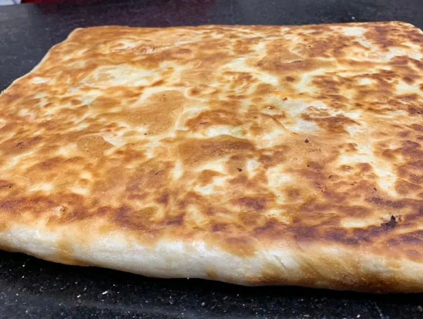 Feteer with Local Sausage and Kiri Cheese