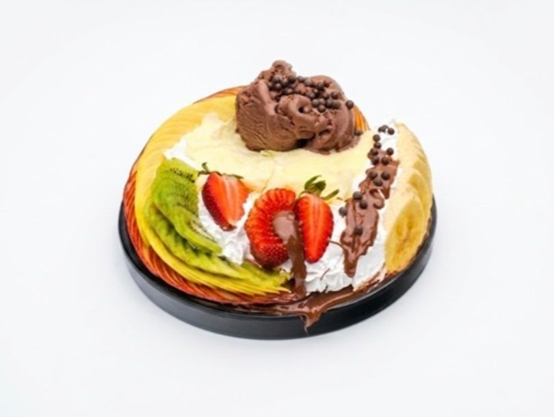 Chocolate ice cream and cream fruit salad
