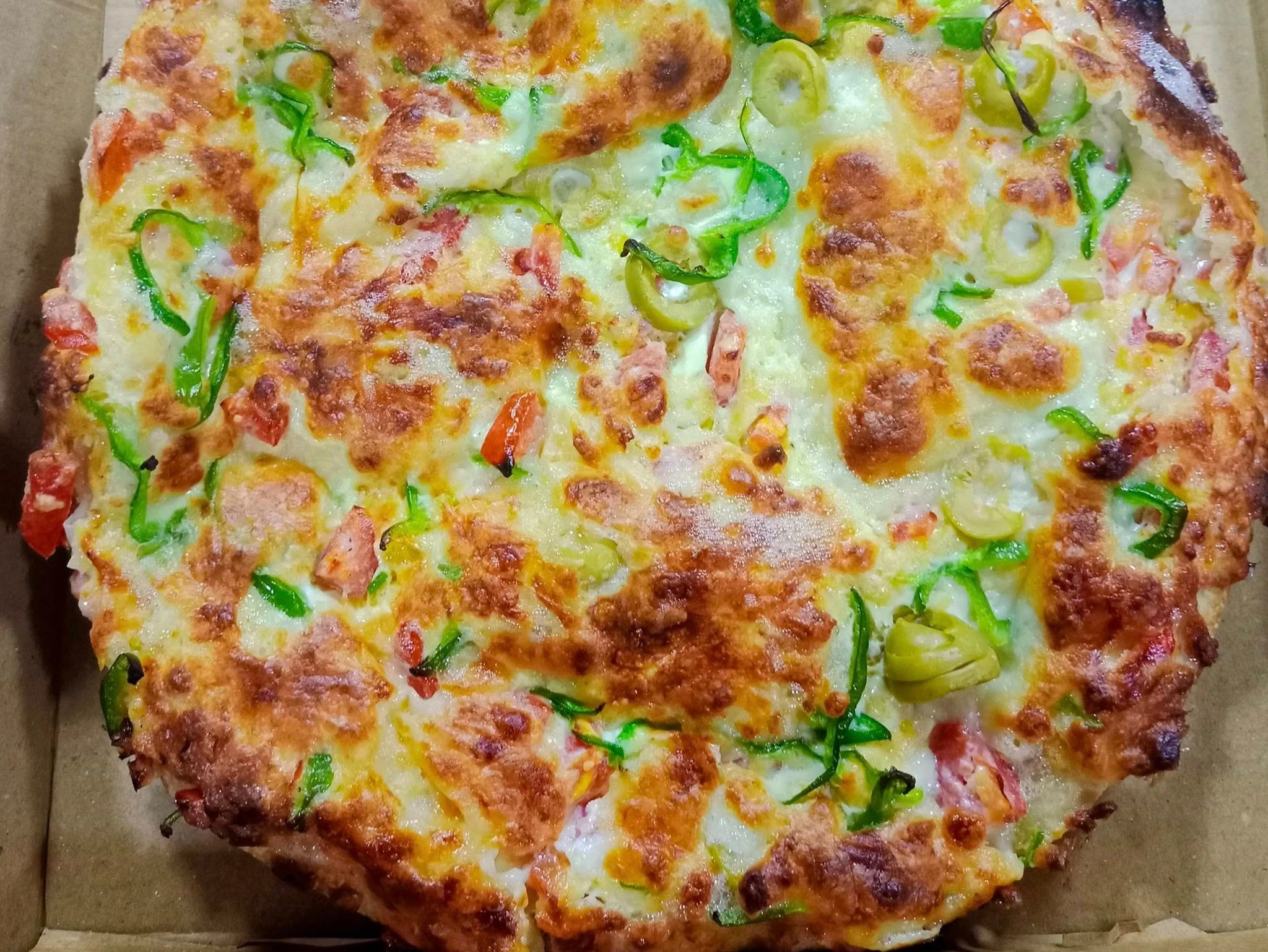 Oriental Pizza with Sausage, Pastrami, and Kiri Cheese