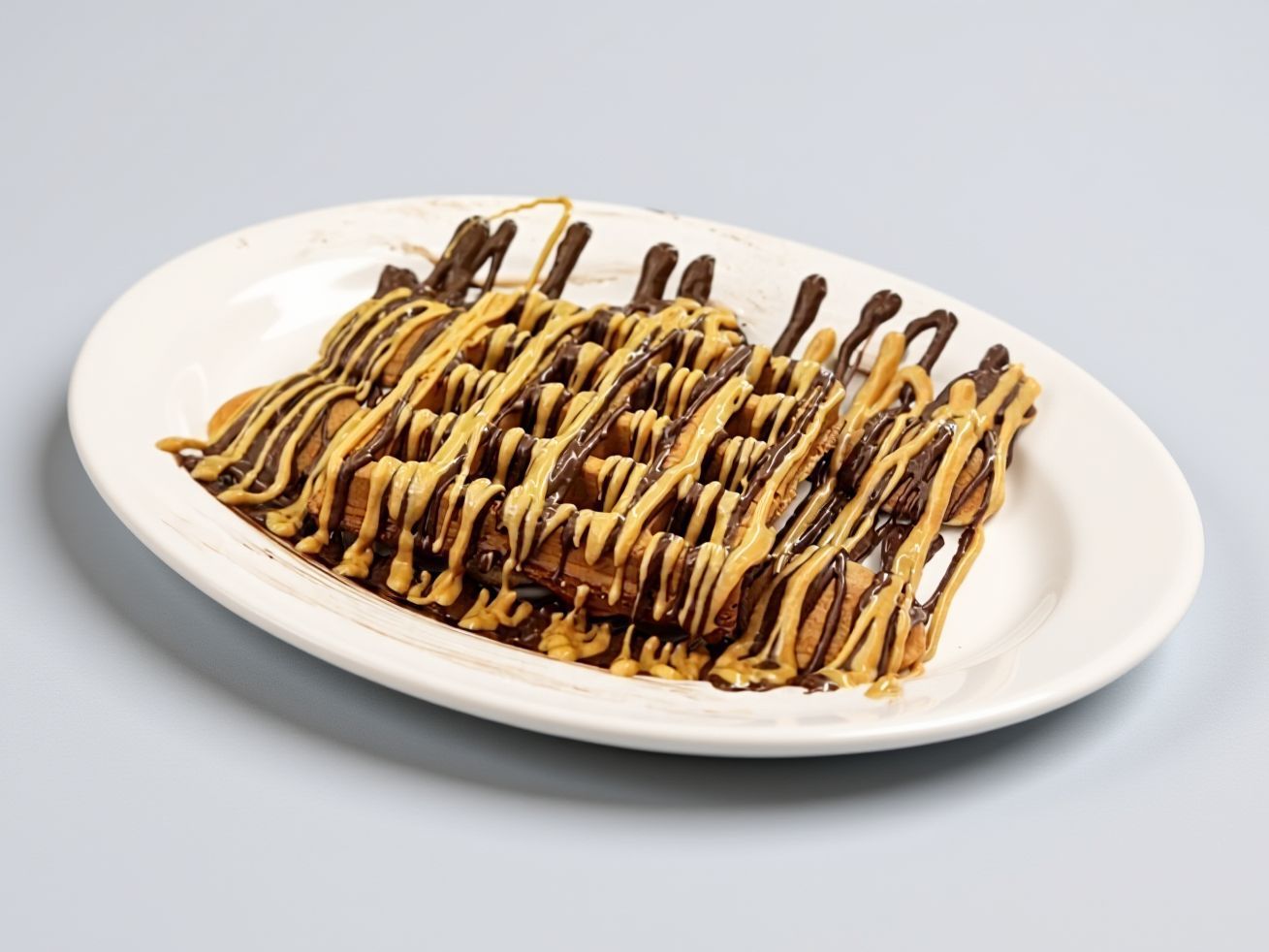 Mini Pan Waffle With Chocolate Sauce And Lotus