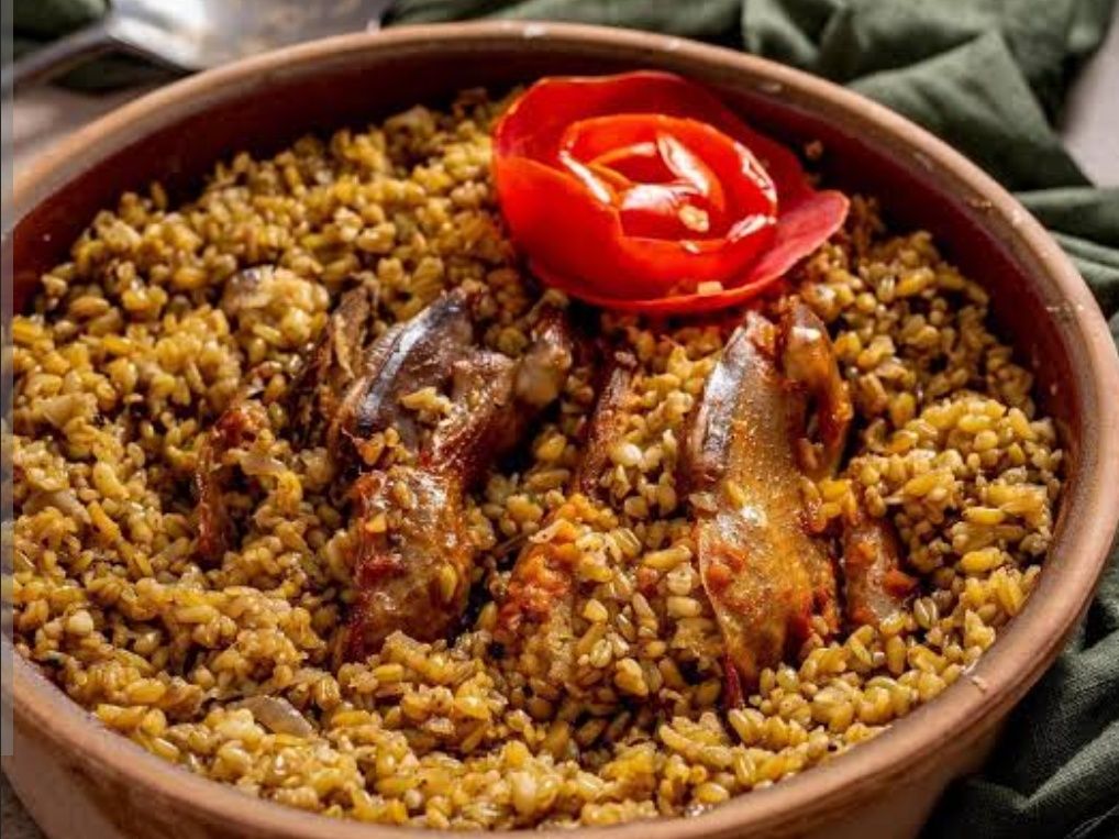Stuffed pigeon tagine with freek