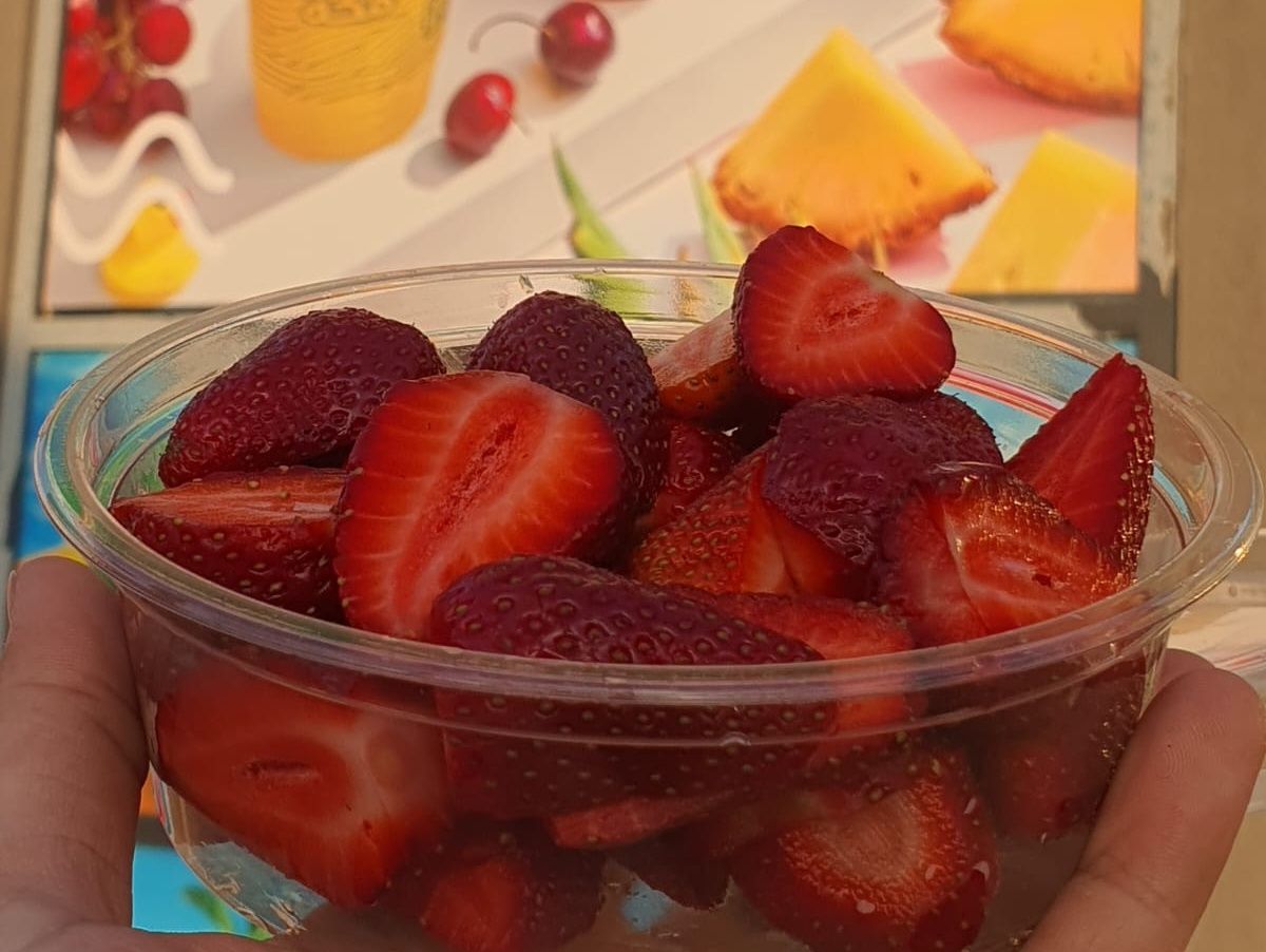 Box of fresh cut strawberries