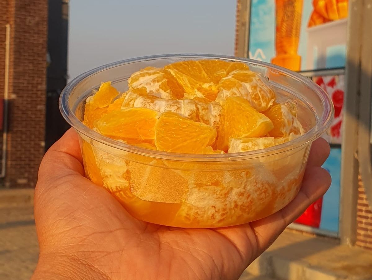 Box of sliced oranges