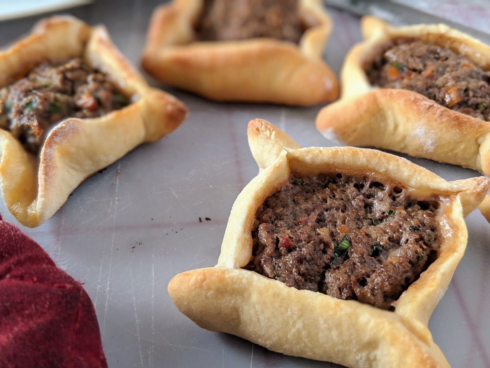 Meat Safiha pomegranate molasses and cheese Manakish