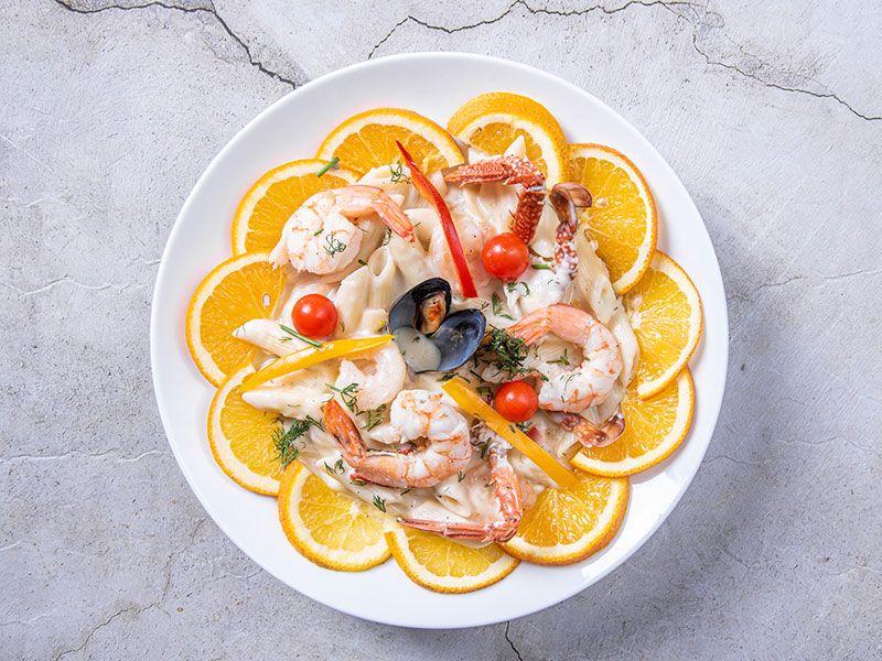 Pasta with seafood in red sauce