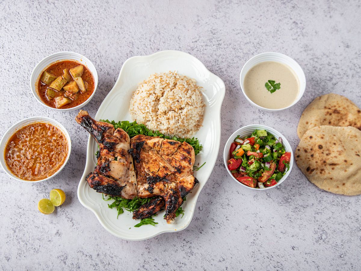 Half grilled chicken meal.