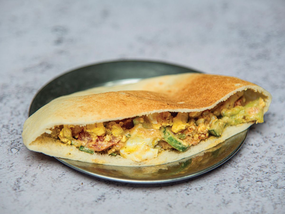 Egg sandwich with cheese and tomato