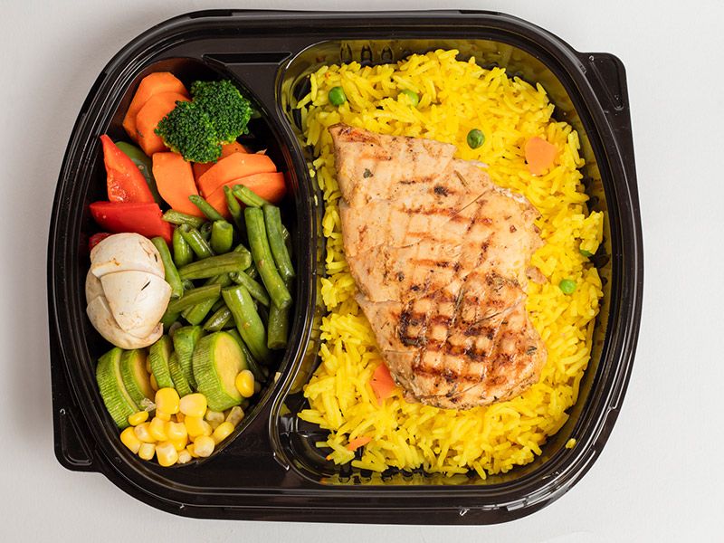 Boneless chicken breast meal on charcoal