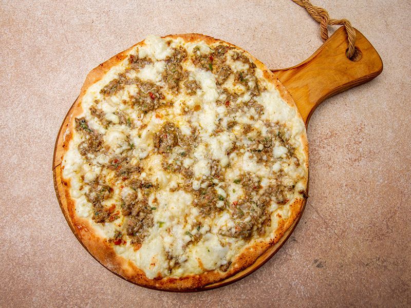 Zaatar with cheese and vegetables Manakish