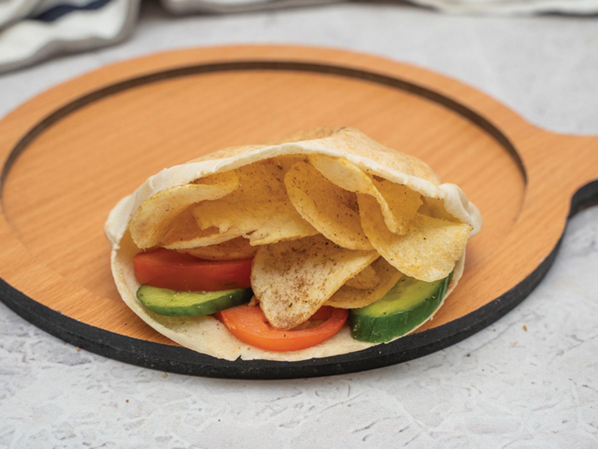 Potato sandwich with cheese and tomatoes