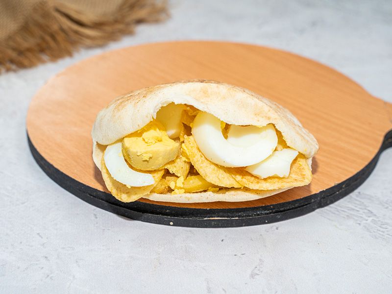 Chips with boiled eggs