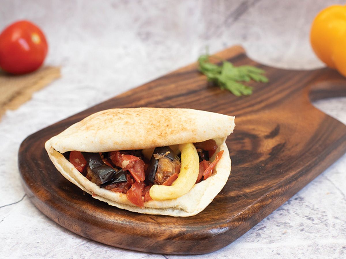 Falafel sandwich with eggplant moussaka