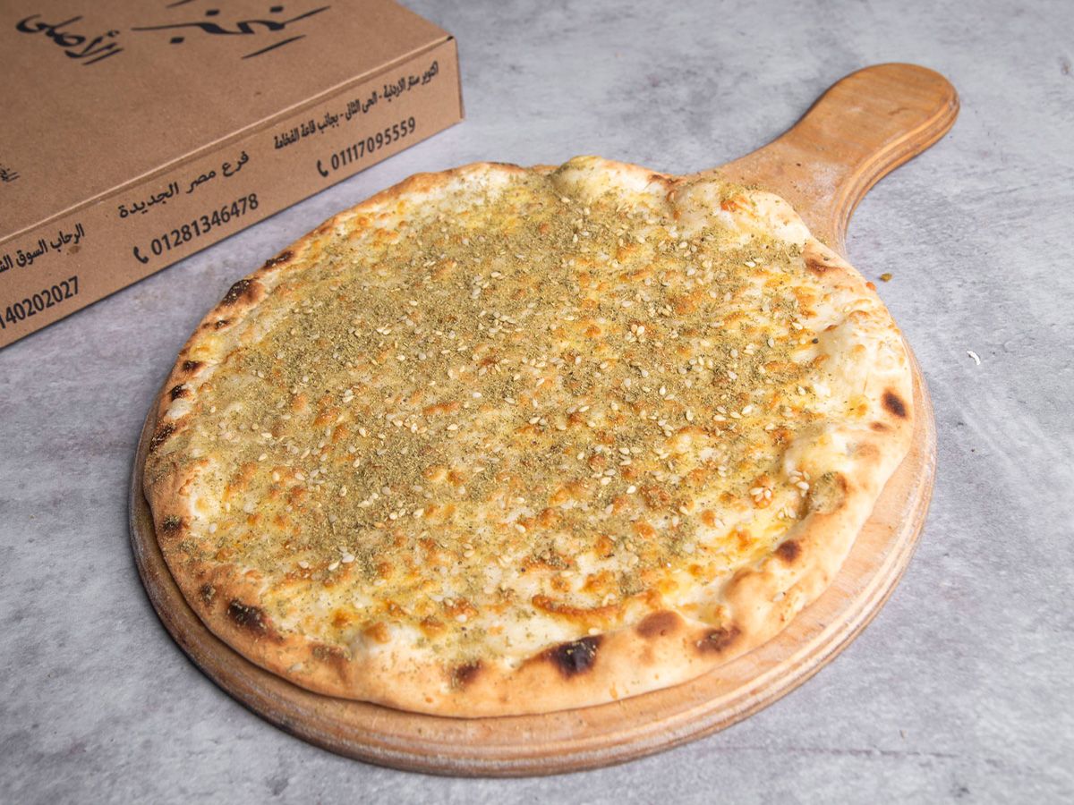 Akkawi and Kashkaval Manousheh with Thyme