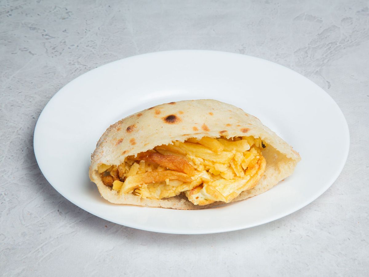Fried potato roll sandwich with Rumi cheese