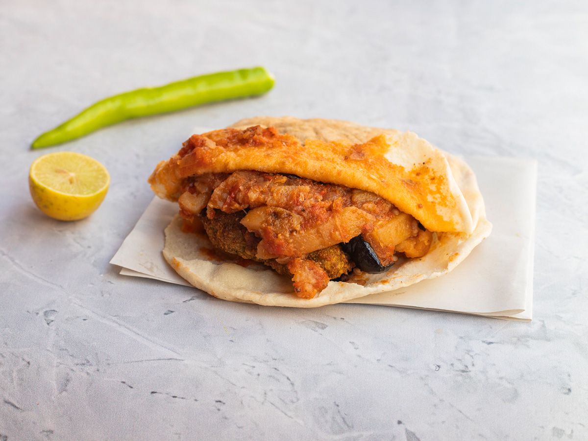 Ta'ameya sandwich with moussaka