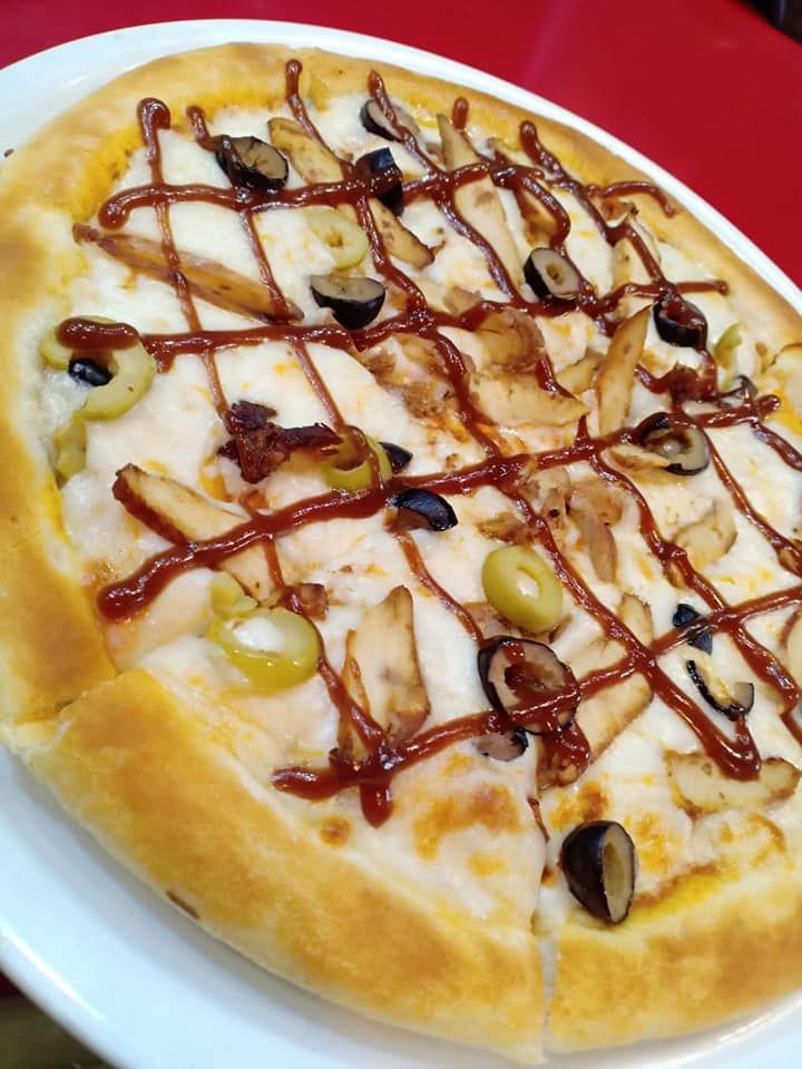 Adding calamari to pizza