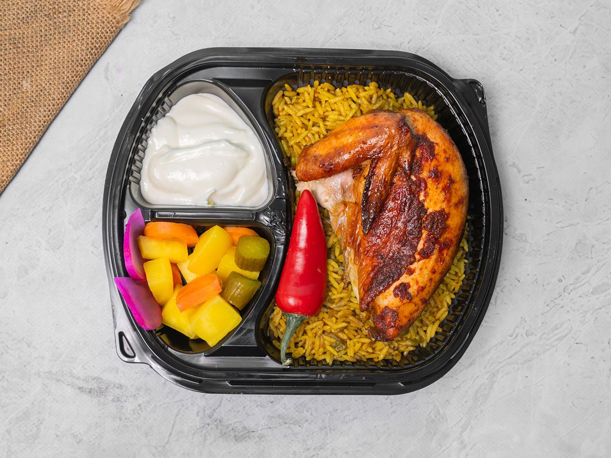 Quarter chicken breast, rice and sauce