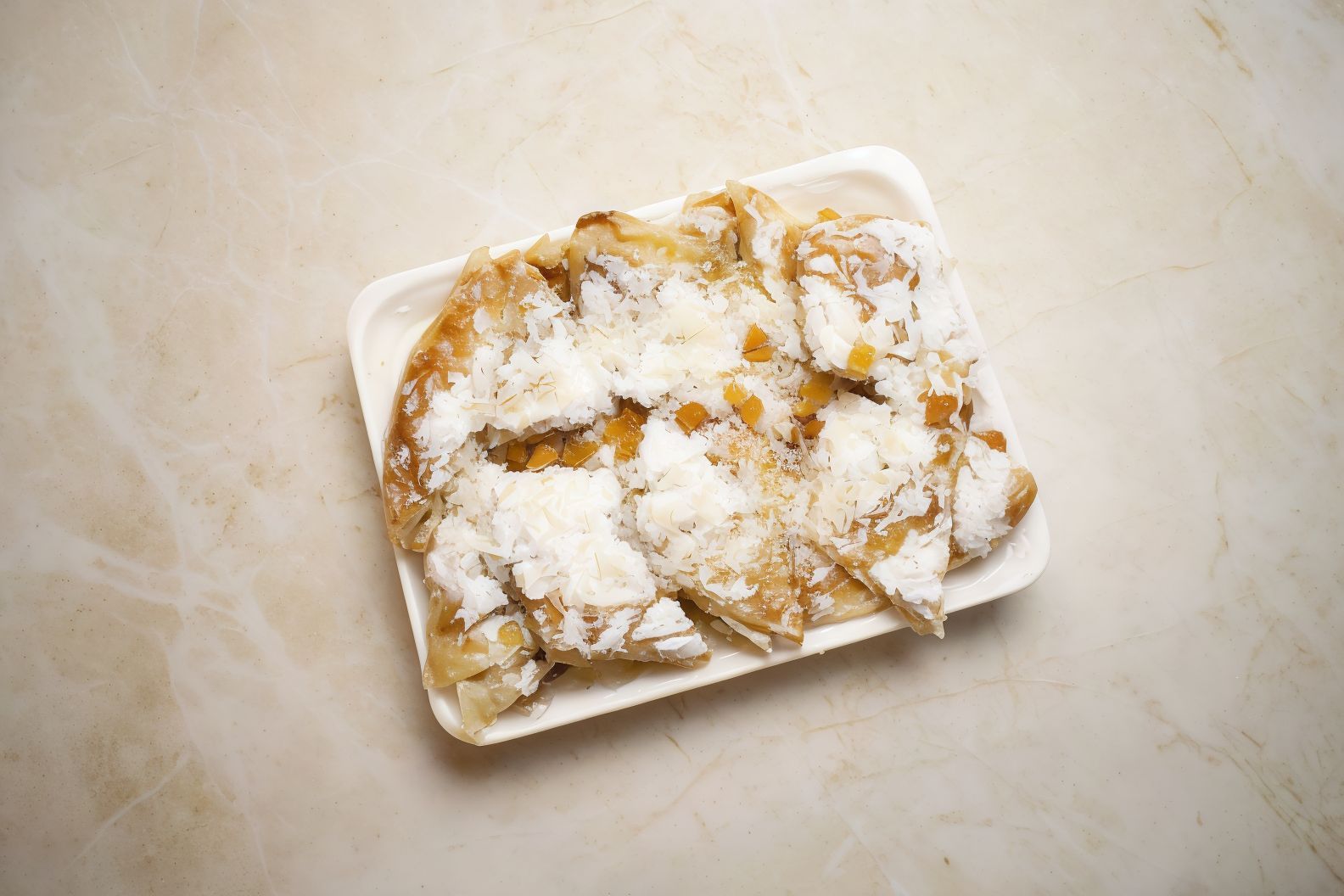 Baghasha pastry with coconut and milk