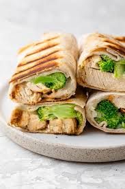 Grilled chicken wrap in brown tortilla bread