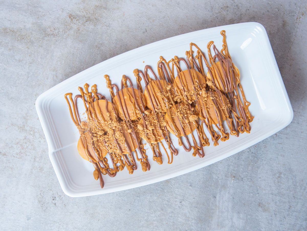 Doughnut duqati pancakes with chocolate sauce and lotus sauce