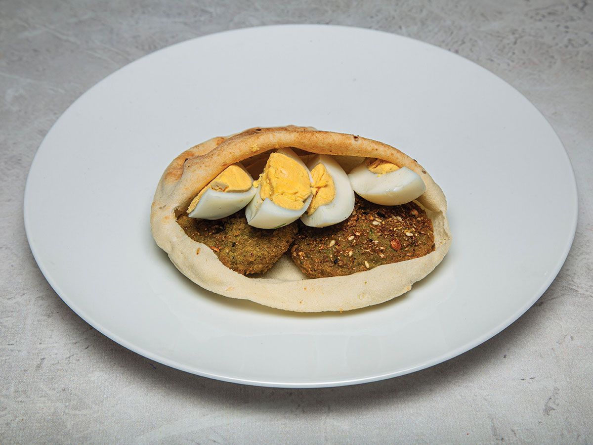 Falafel on eggs sandwich