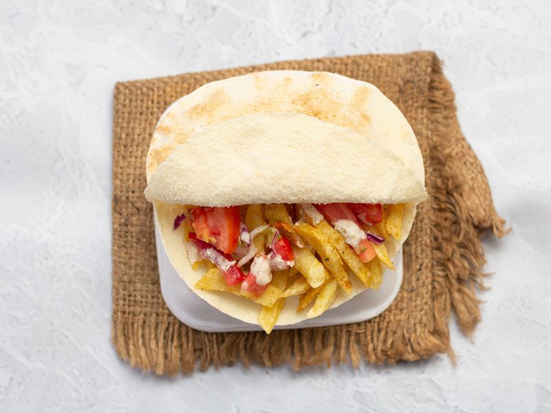 Potato with cheese and tomato sandwich