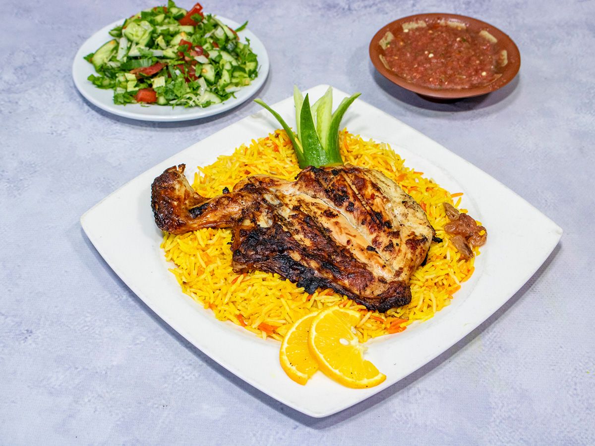 quarter mandi chicken breast, rice and sauce