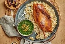 Half duck with rice and molokhia