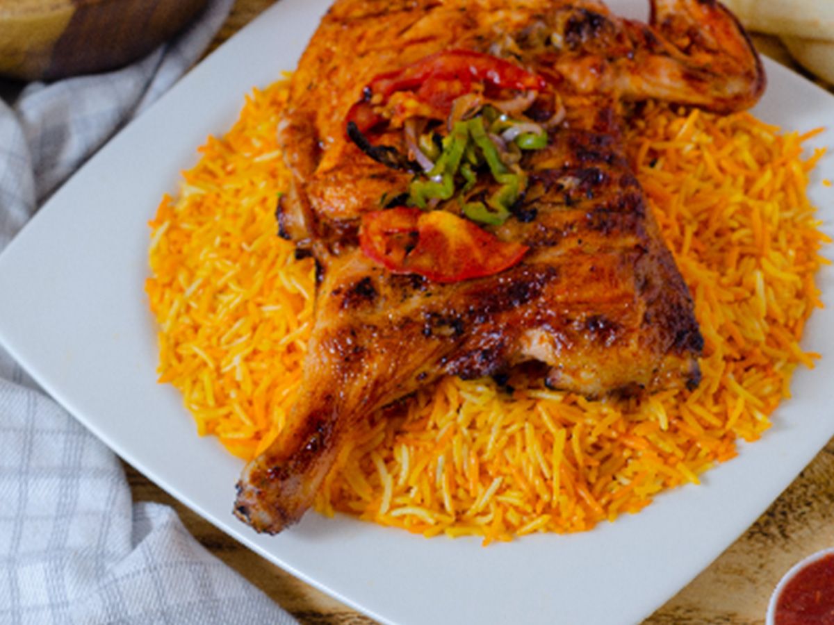 نصف دجاج مشوي مع ارز كبسه او بيرانى
