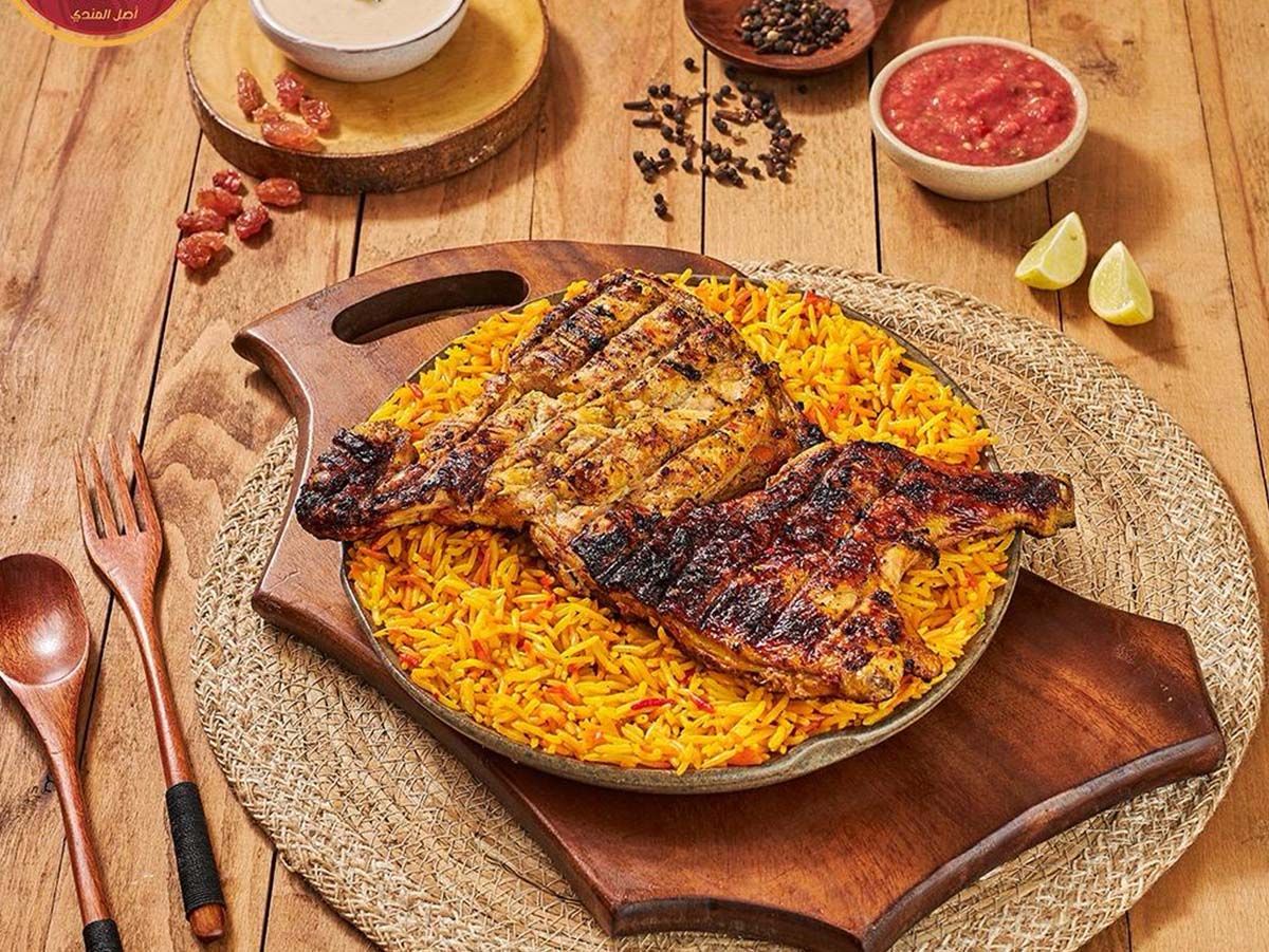 Half chicken grilled with rice