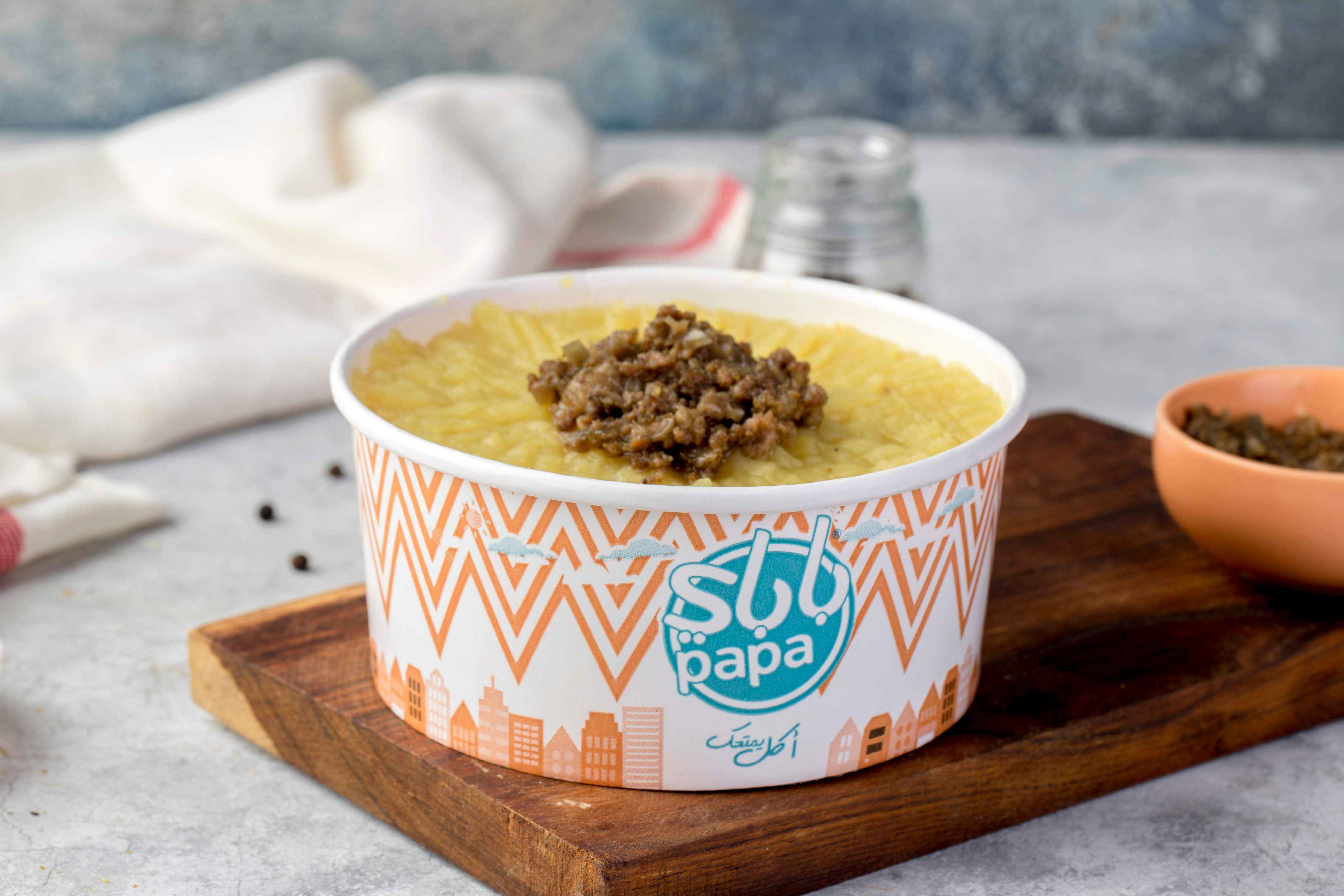 Box of mashed potatoes with minced meat