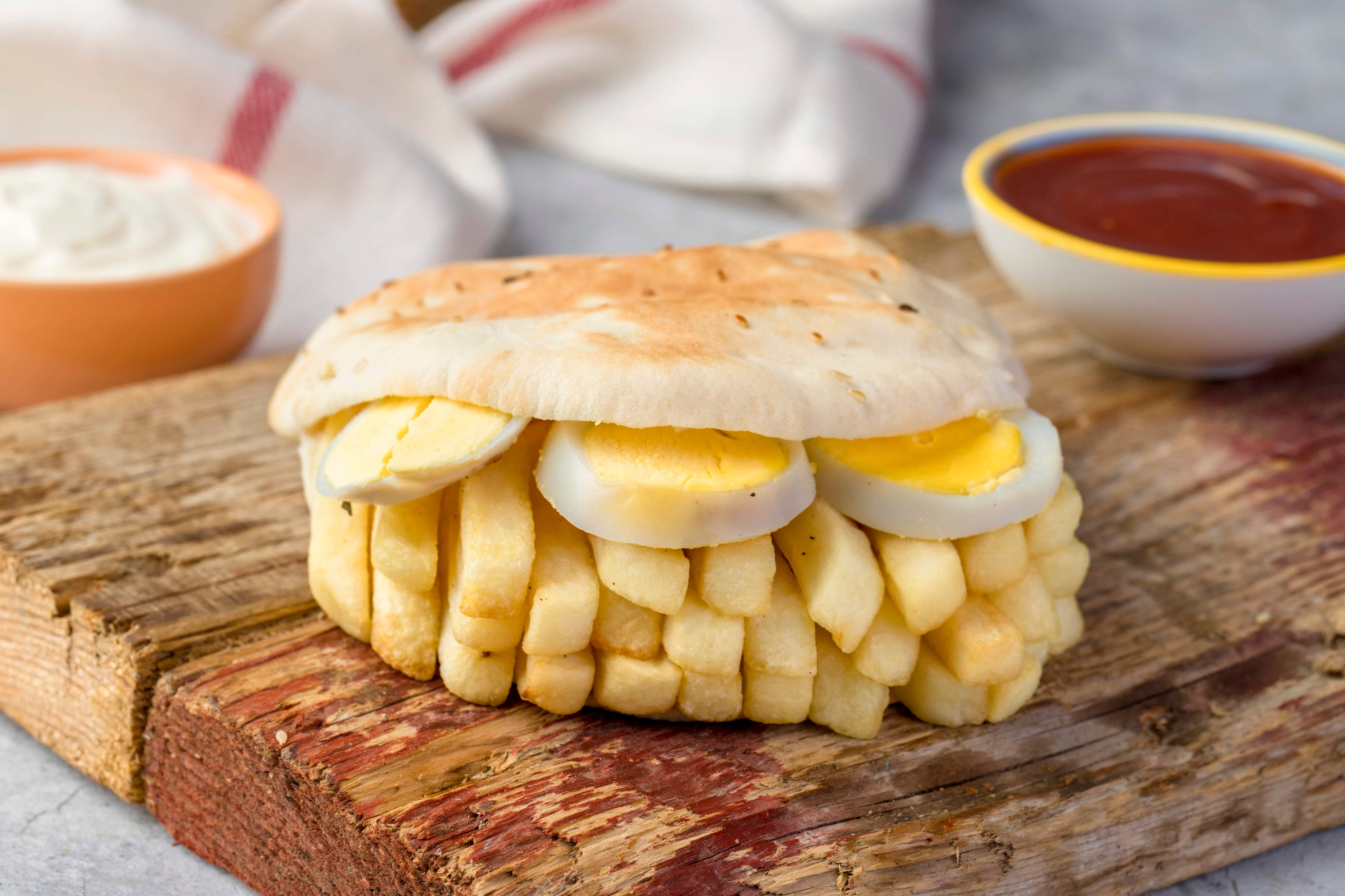French fries sandwich with eggs