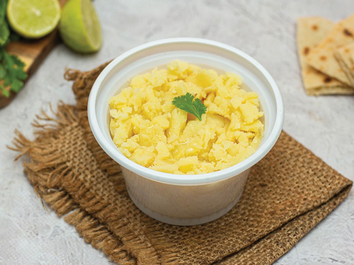 Small box of mashed potatoes with boiled eggs