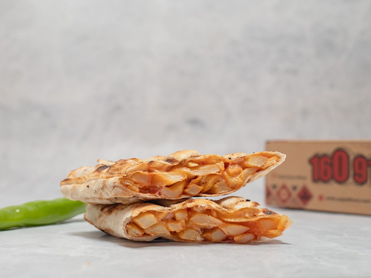 French fries sandwich with ketchup and mayonnaise in Arabic bread