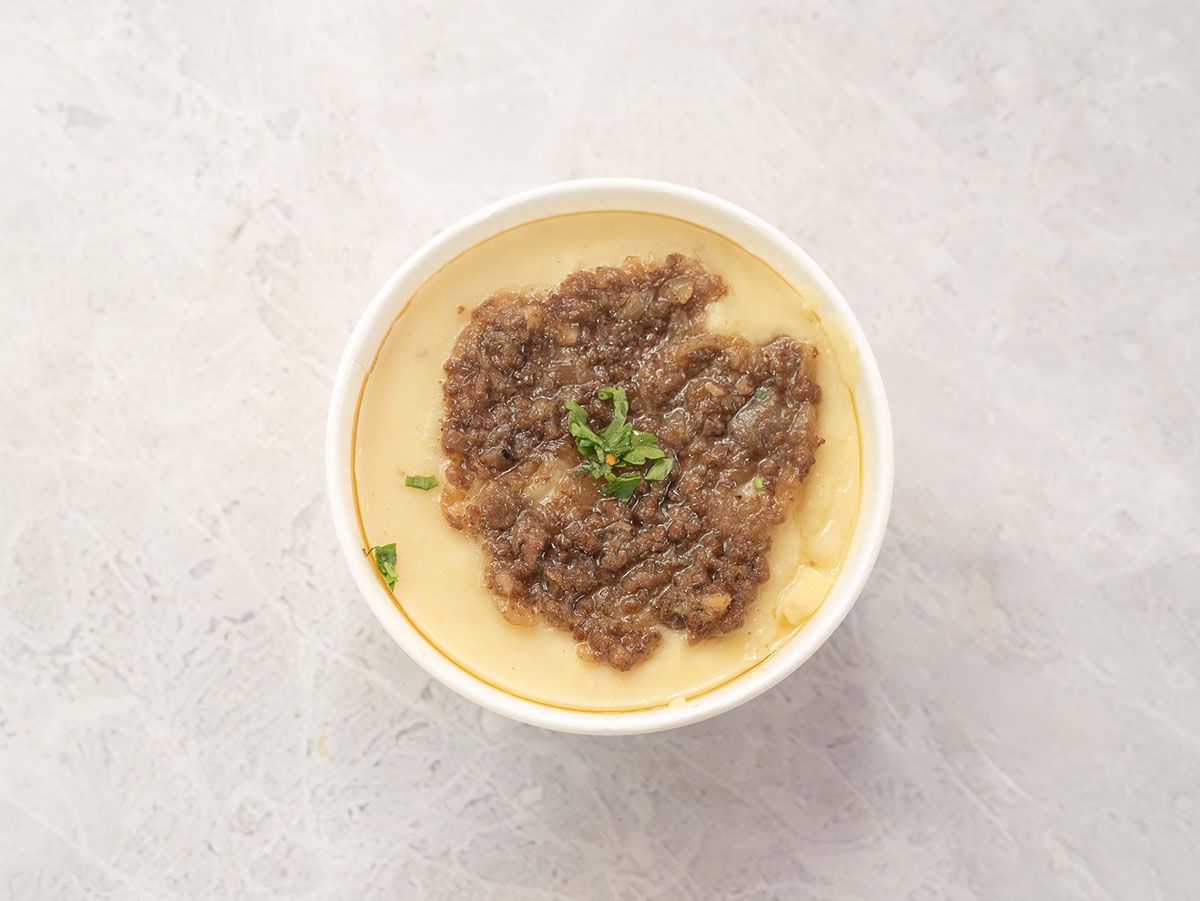Box of potato puree with minced meat