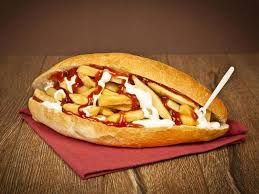 Vienna bread sandwich with potatoes, ketchup and mayonnaise