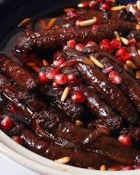 Lebanese sausage with potatoes and pomegranate