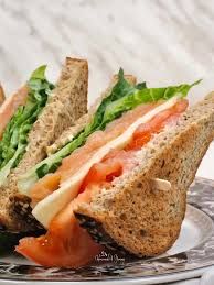 Smoked salmon sandwich on brown toast