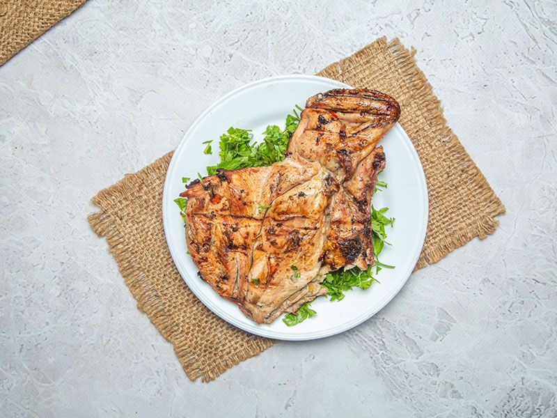 Quarter grilled chicken breast