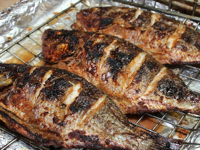 Grilled Mullet Fish With Seafood Soup Meal