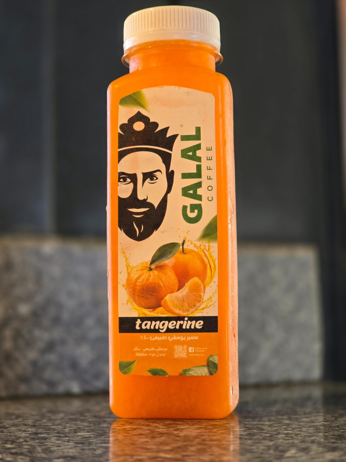 Fresh tangerine juice bottle
