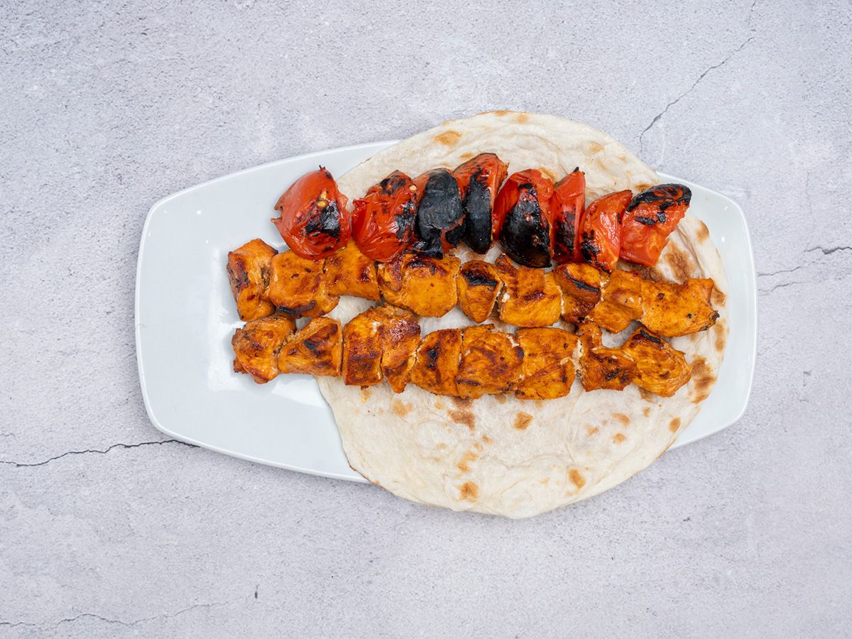 Kilo Of Shish Tawook On Charcoal With Green Salad Bread And Tahini