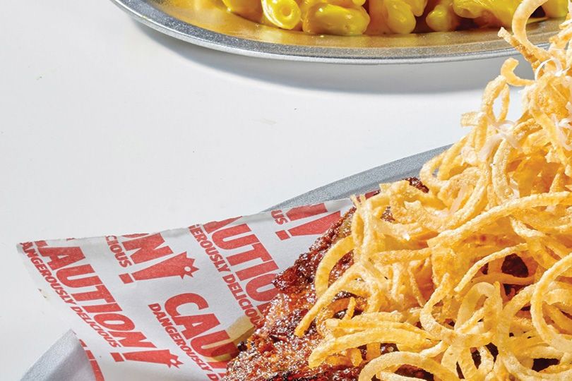 half Chicken Honey Truffle Shoestring fries, served with Mac & cheese