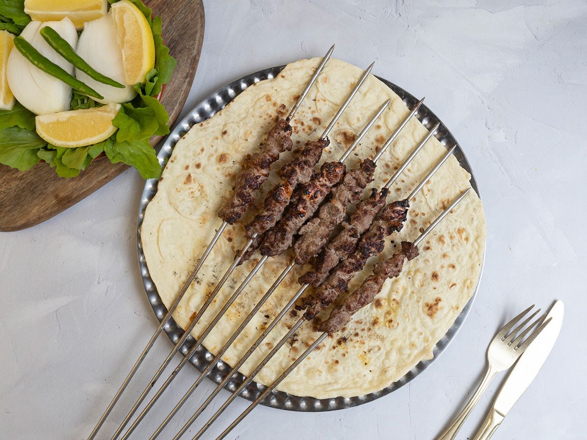 1/4 kilo Kofte with green salad, bread, and tahini