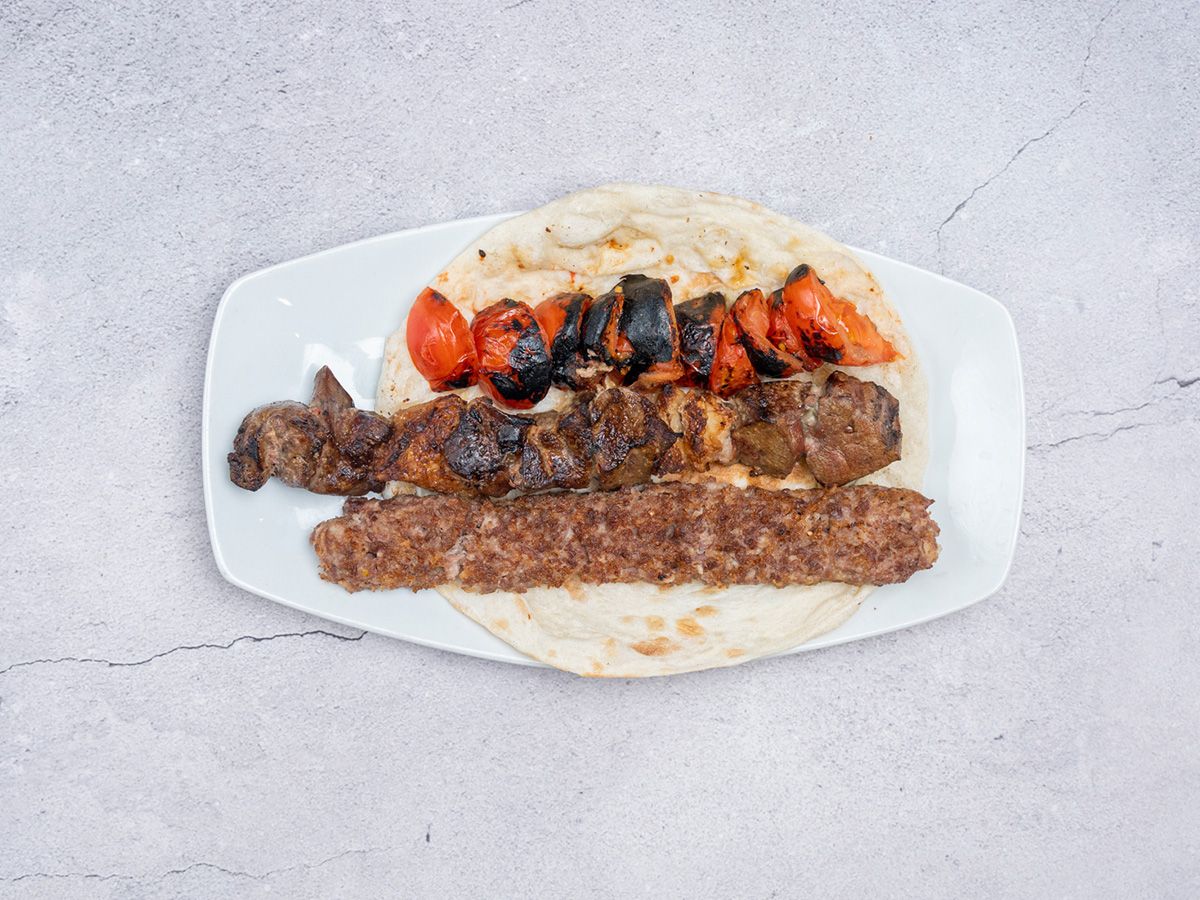 1/4 kg mixed kebab and kofta with green salad, bread, and tahini
